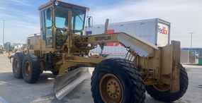 Caterpillar Motor Grader at Machinery Marketplace - mdl-caterpillar-motor-grader-140g-c2f5b865-1.jpg