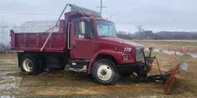 Freightliner Dump Trucks at Machinery Marketplace - mdl-freightliner-dump-trucks-fl60-227eca14-2.jpeg