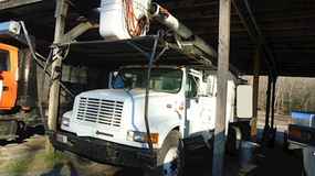 International Other Trucks & Trailers at Machinery Marketplace - mdl-international-other-trucks-trailers-4700-navistar-dt466e-chip-bucket-truck-4x2-c36eb549-1.JPG