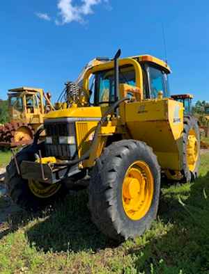  John Deere 7410 Tractor w/Alamo Mower 4x4 - John Deere Tractors